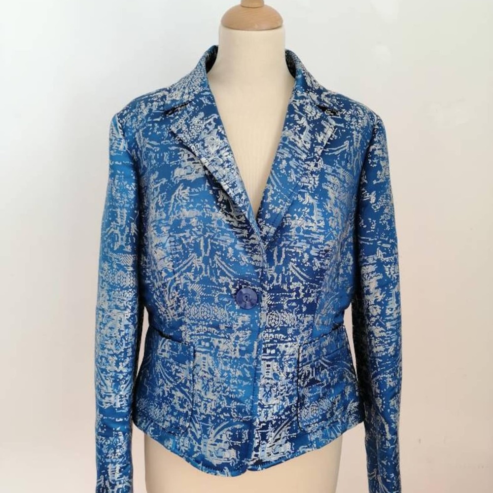 Etro Milano, size M, light blue jacket with an oriental motif.